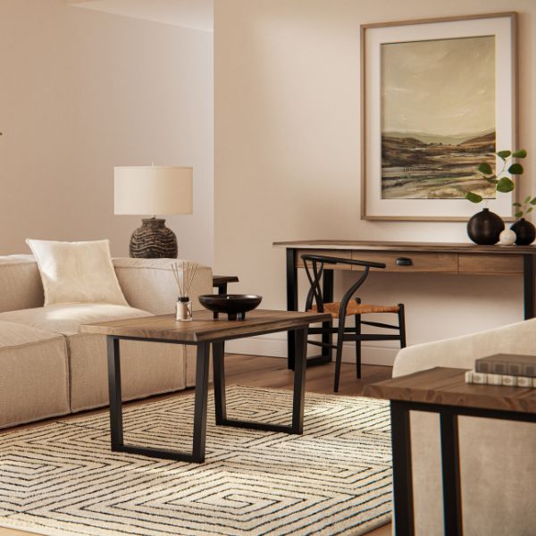 A contemporary living room setting featuring a sofa table, coffee table, and side tables with a modern design.