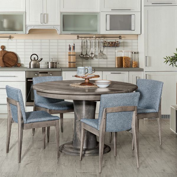 grey wood dining table and blue chairs