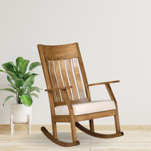 An Amish elegant solid wood rocker with a plush upholstered seat, made in the USA, shown in brown color with a cream upholstered seat.