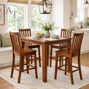 Wooden dining table with chairs in a bright kitchen setting