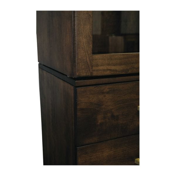 Dark wooden cabinet with glass panel on a white background