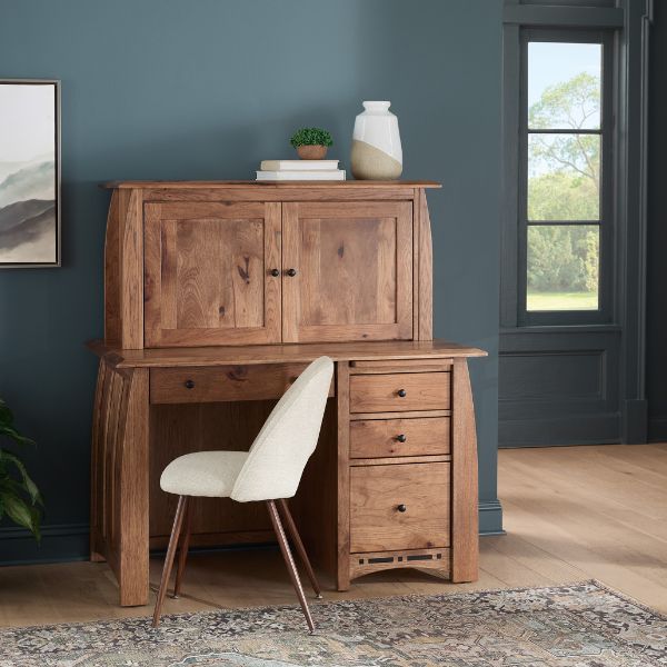 wooden desk and white chair
