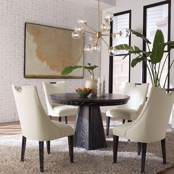 4 white tables and a dark almost black wood