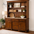 Wooden hutch with decorative items in a room setting