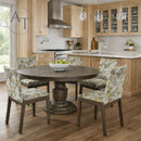 Dining area with wooden table and chairs in a kitchen setting