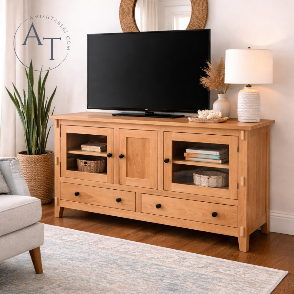 Wooden TV stand with a television in a living room setting.