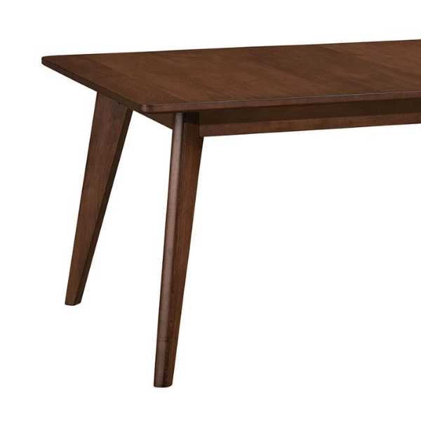 A rectangular brown wooden dining table with a smooth finish and mission edge, supported by tapered legs.
