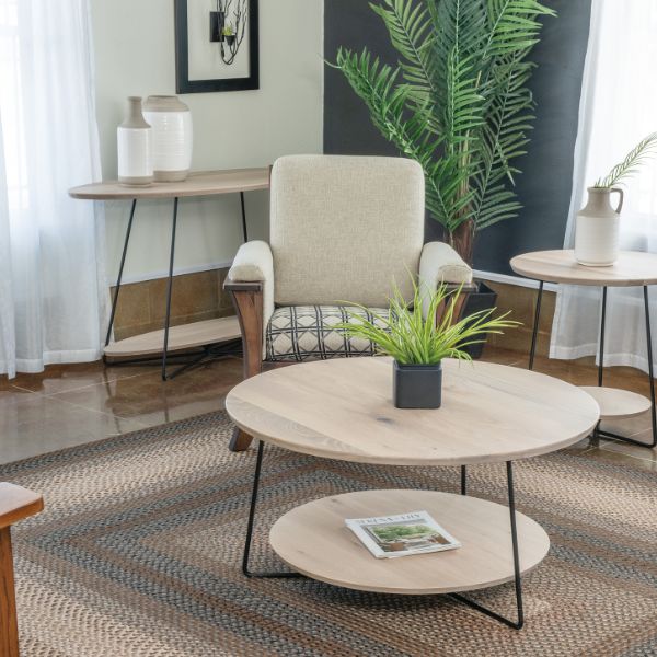 oak wood table set with black legs in a living room 