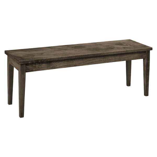 A contemporary wooden dining bench with a brown stain finish on the wood and a gray upholstered seat pad.