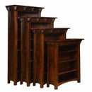 A set of wooden bookcases in varying sizes with a dark stain finish, featuring adjustable shelves and a traditional design.