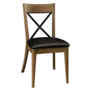 A contemporary dining chair with a metal inlay back and a wood seat, pictured in oak with almond stain and a black metal back.