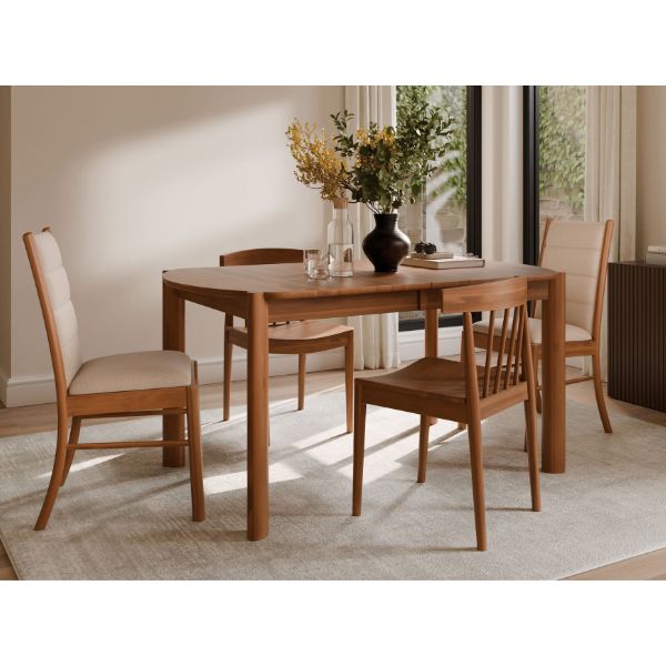 dining room table with a vase, book, and a water on it. 4 chairs around it 