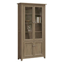 A brown Premier bookcase with glass doors on the top and wooden doors on the bottom, featuring adjustable shelves inside.