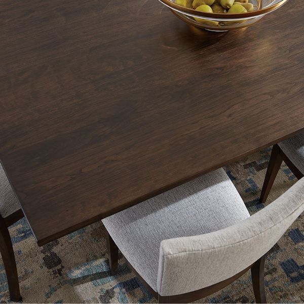 close up of cloth of chair and wood of table
