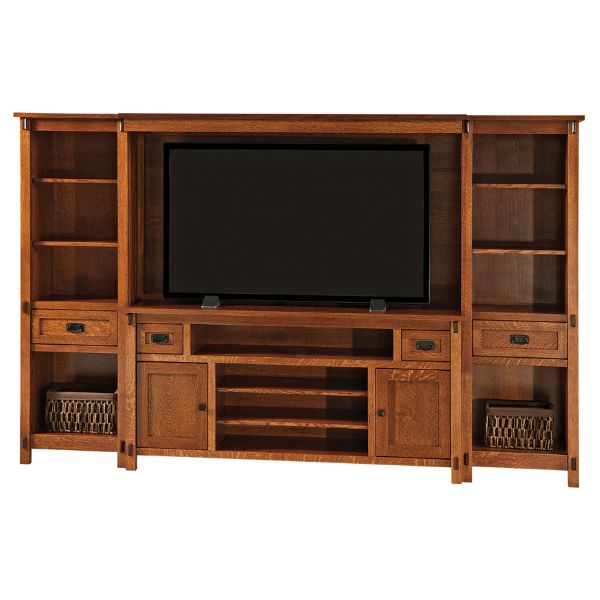 A brown wooden media wall unit with a flat-screen TV on top, multiple shelves, and drawers.