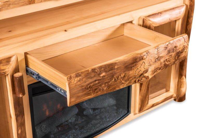 opening the cabinet for a fireplace