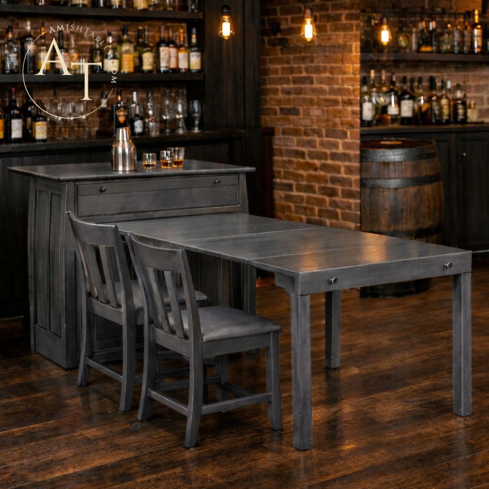 Gray dining table with chairs in a bar setting with brick walls and shelves of bottles.