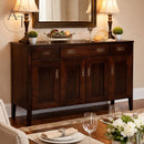 Wooden sideboard with decorative items in a room setting