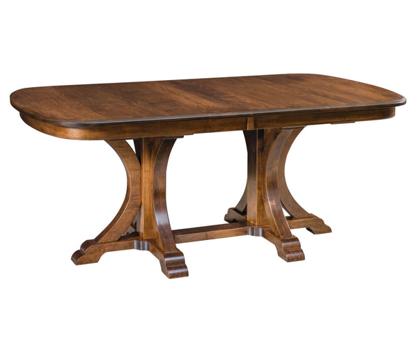 A rectangular granite double pedestal extension dining table with a wood top and pedestal base, shown in a finished wood color.