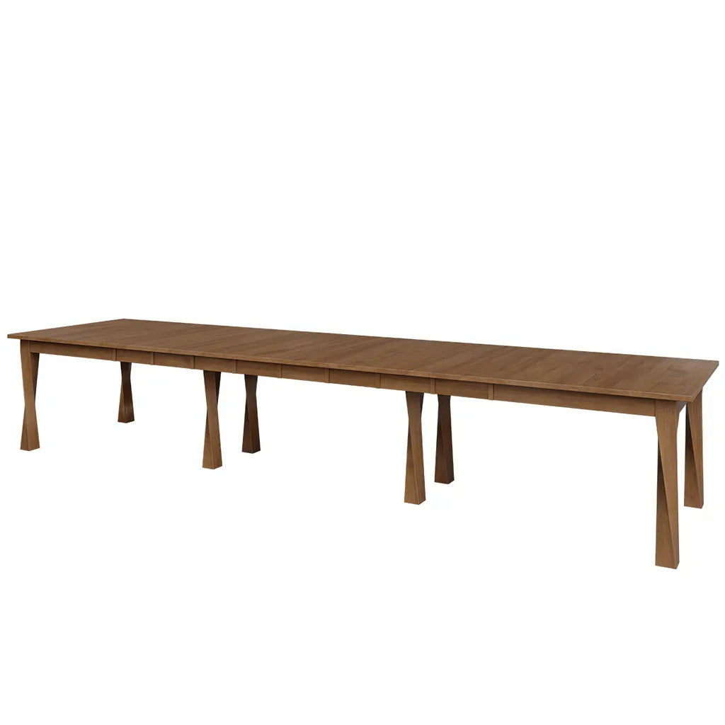 A long rectangular wooden dining table with center support legs, shown on a plain white background.