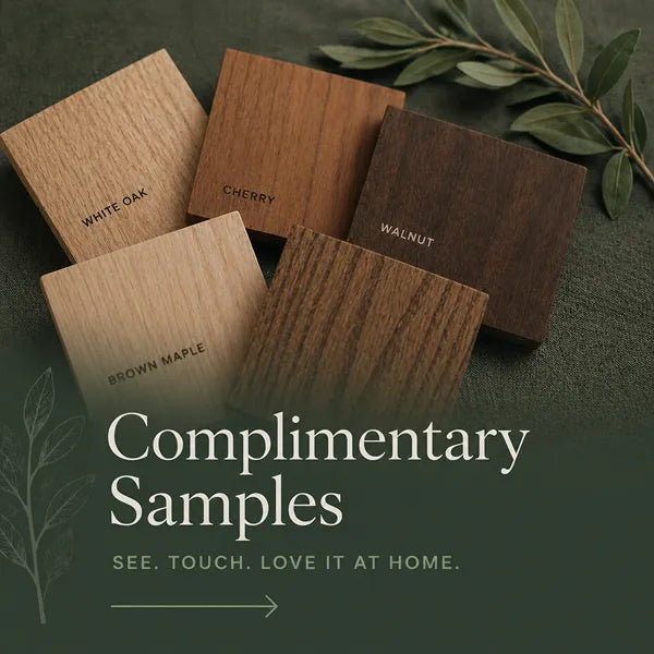 Wood sample blocks labeled 'White Oak', 'Cherry', 'Walnut', and 'Brown Maple' on a dark background with text 'Complimentary Samples'.