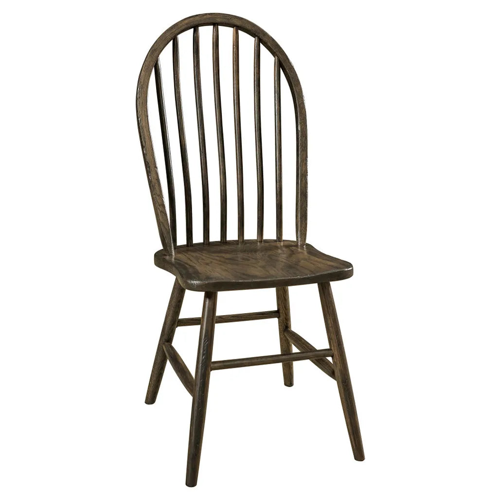 A dark brown wooden dining chair with a spindle backrest and seat, shown against a plain white background.