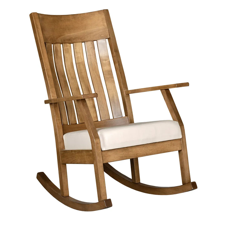 A wooden rocking chair with a slatted backrest, armrests, and a cream-colored seat cushion, shown against a plain white background.