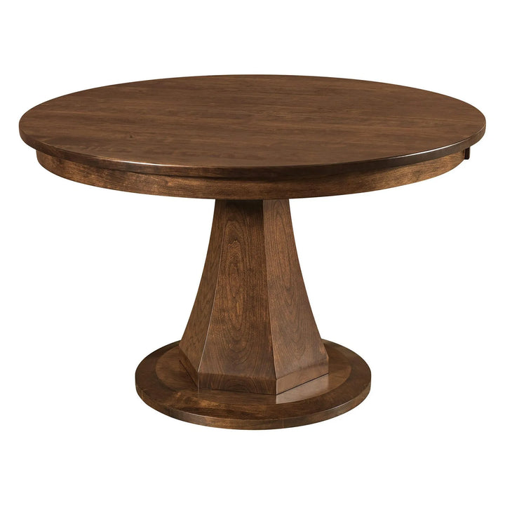 A round wooden dining table with a dark brown finish, featuring a tapered pedestal base and a circular foot ring, shown against a plain white background.