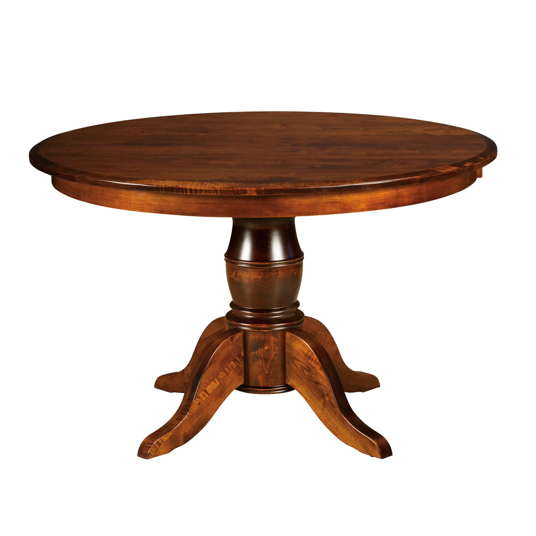 Round amish solid wood table with a single pedestal base on a white background