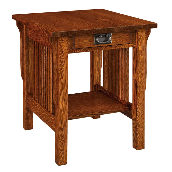 A square wooden end table with a single drawer, featuring a warm medium-brown oak finish, a dark metal pull handle, and an open lower shelf, shown on a plain white background.