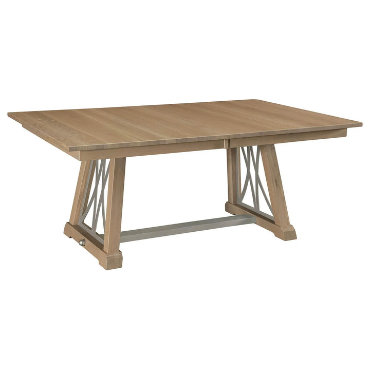 A light oak extending dining table with a natural wood top and a silver-finished metal trestle base on a white background.