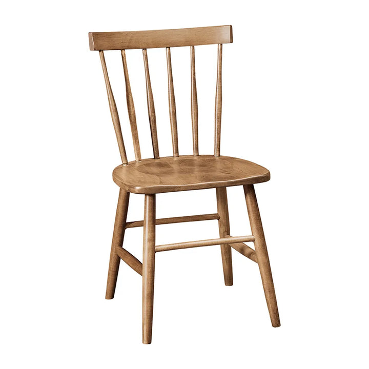 A wooden dining chair with a spindle backrest and a rounded seat, shown on a plain white background.