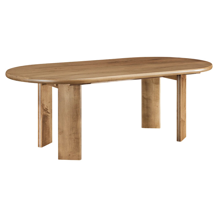 An oval wooden dining table with thick block-style legs, shown on a plain white background.