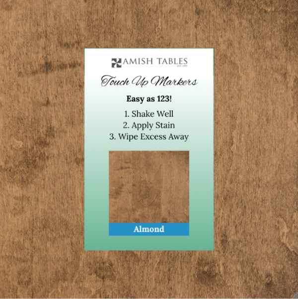 Amish Tables touch-up markers packaging on a wooden surface