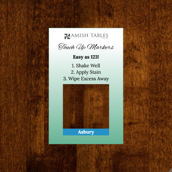 Amish Tables touch-up marker packaging on a wooden surface