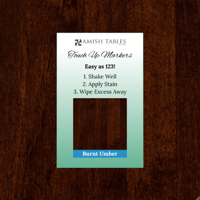 A touch up marker label for Burnt Umber color on a wooden surface.