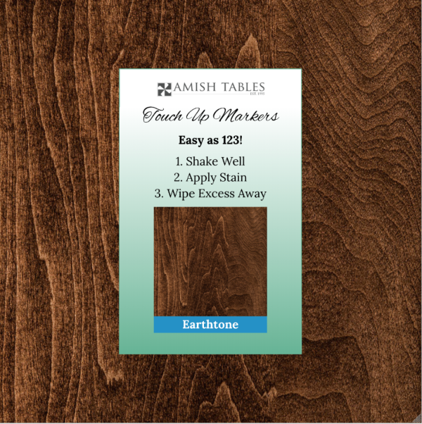 A product packaging for 'Amish Tables' Earthtone Touch Up Marker, displayed on a wooden background.