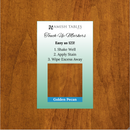 A product image featuring a touch up marker packaging with the brand 'Amish Tables' and a sample swatch of 'Golden Pecan' showing the wood grain texture.