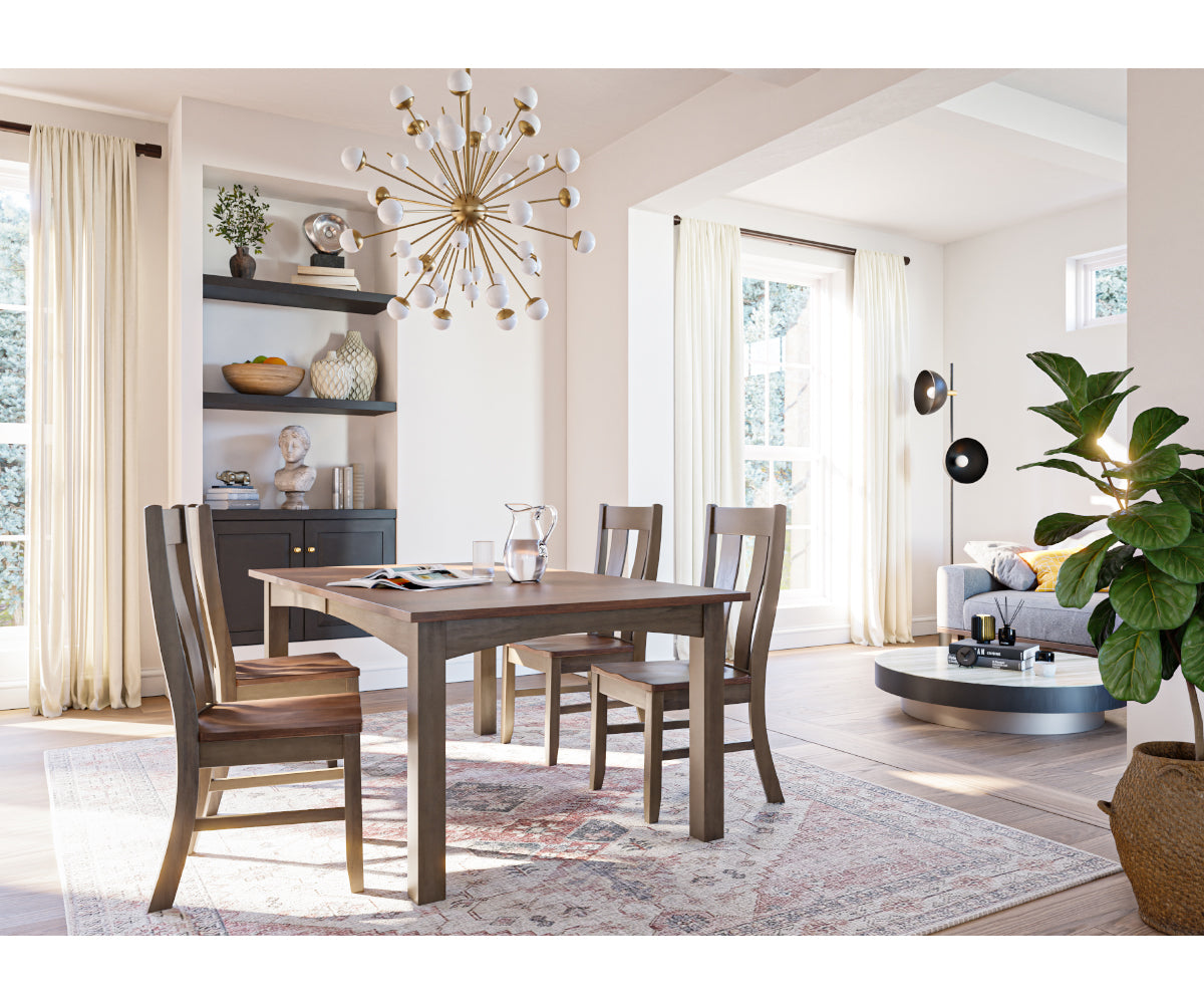 Heidi solid wood leg extension dining table with Garrison chairs in a modern, sunlit dining room