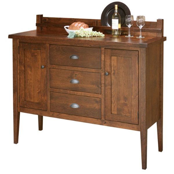 A Jacoby sideboard made of solid hardwood with a plate rack on top, featuring multiple storage drawers and doors, displayed in a rustic cherry finish.