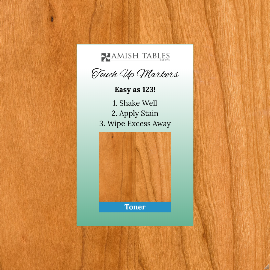 A product image showing a touch up marker packaging with the brand 'Amish Tables' on a wooden background.